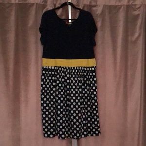 ModCloth navy dress with white polka dots and yellow waist